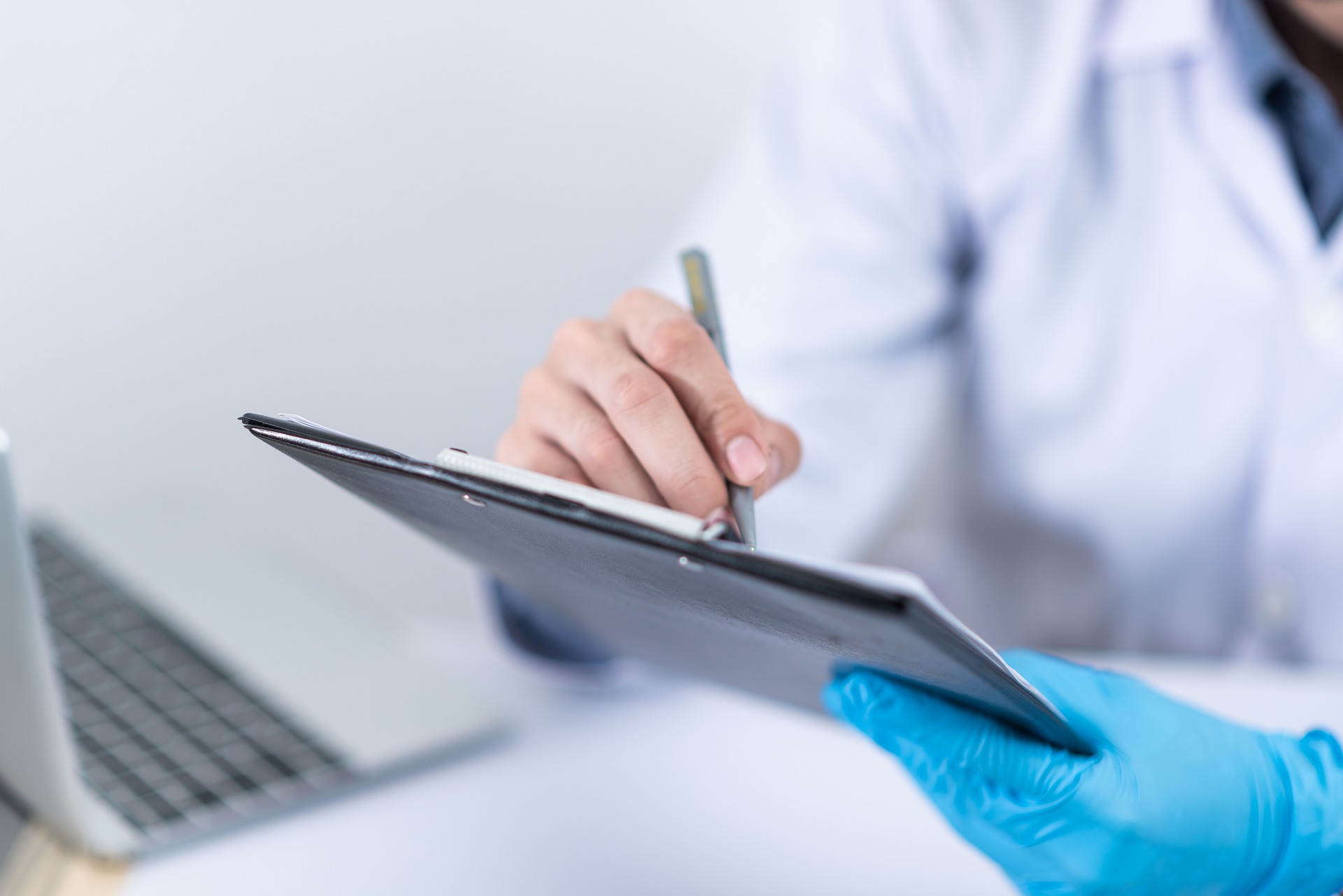 Photo of healthcare worker using tablet